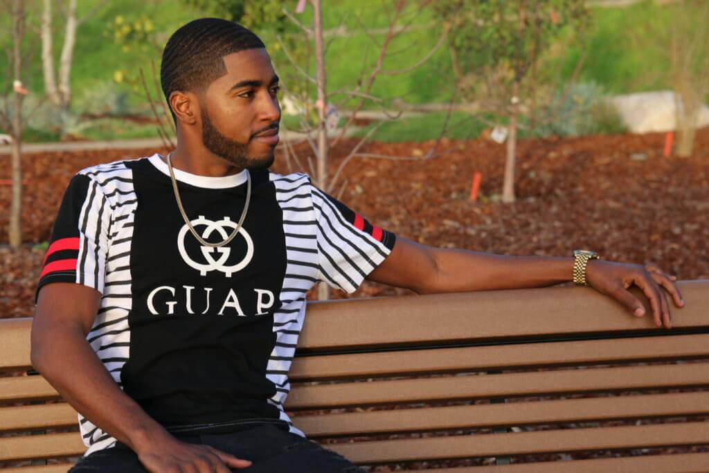 man full beard sitting on bench