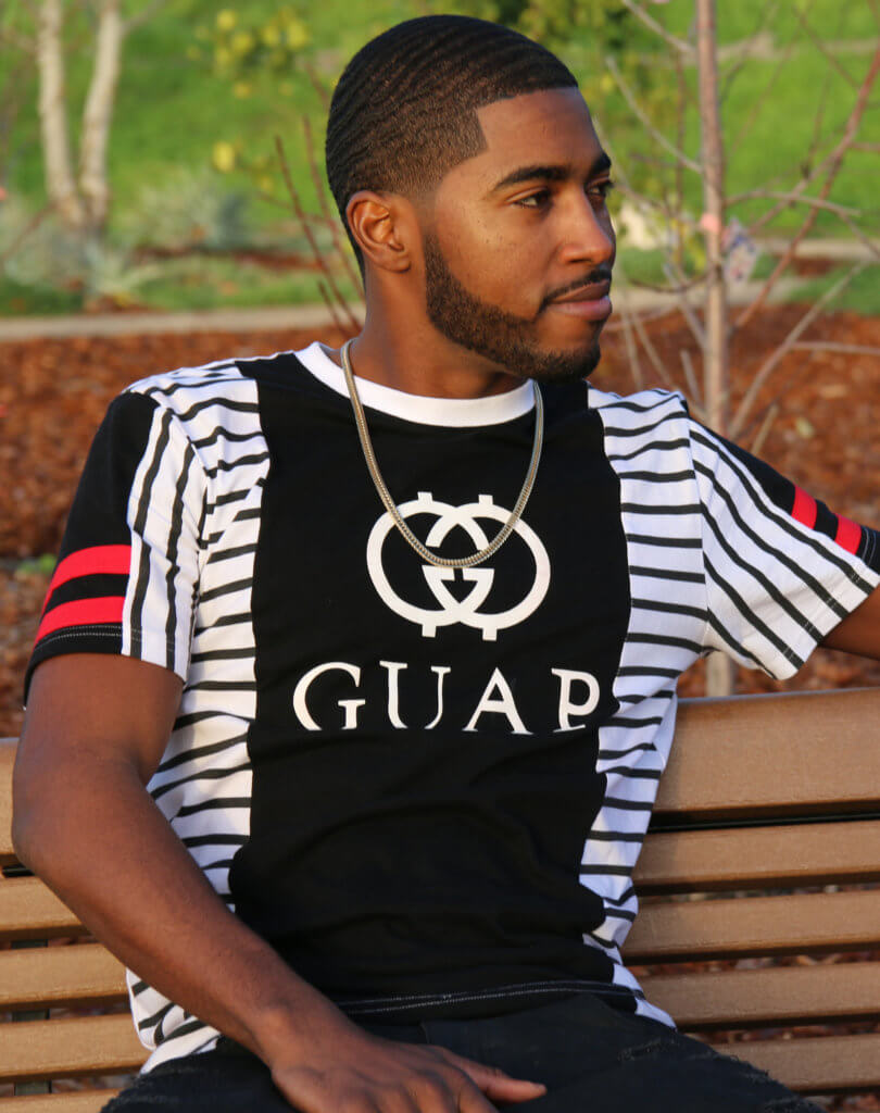 man full beard sitting on bench