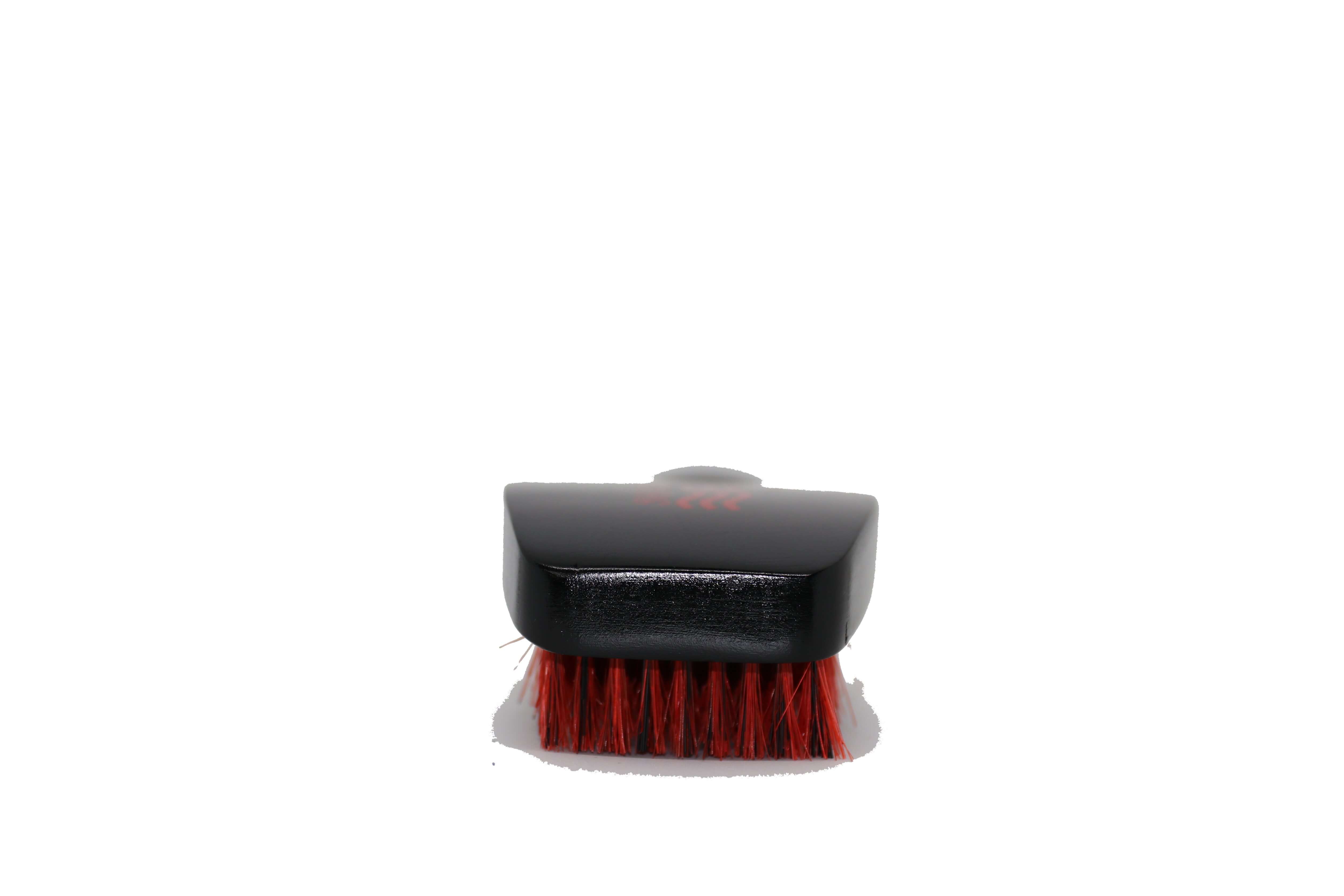 Black brush red bristles